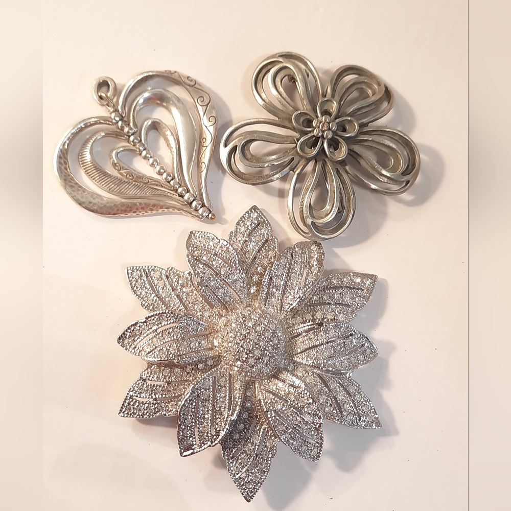 Silver And Pewter Pendants And Brooch Floral